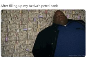 flling activa petrol tank after crude oil prices are down
