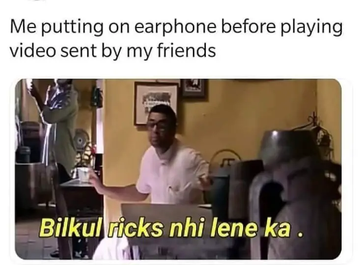 putting on earphones before playing video sent by friend