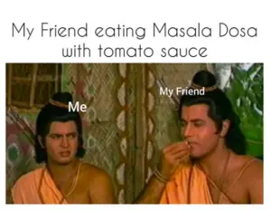 Eating Masala Dosa With Tomato Sauce