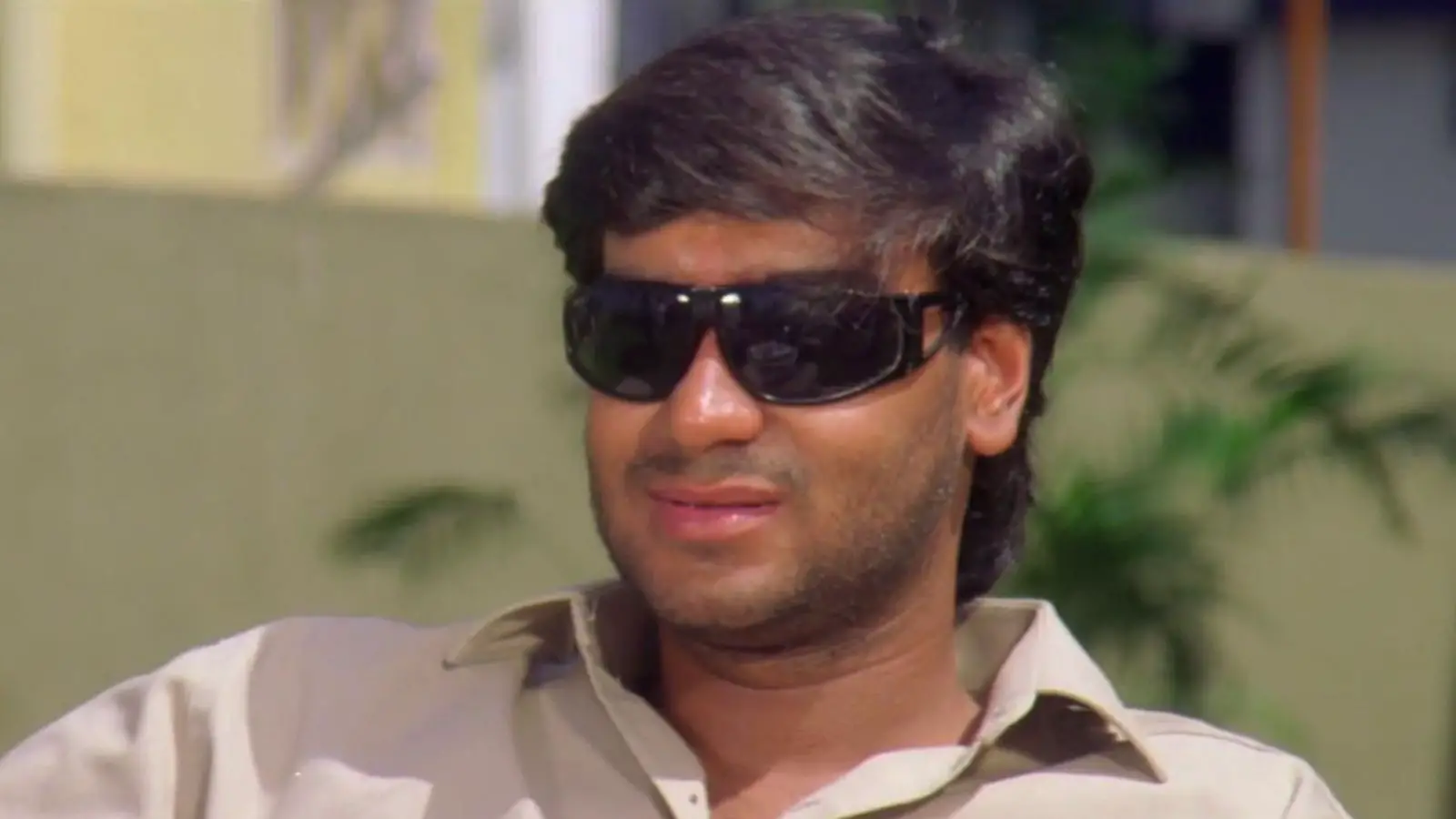 Ajay Devgn smiling wearing glasses meme template of Vijaypath