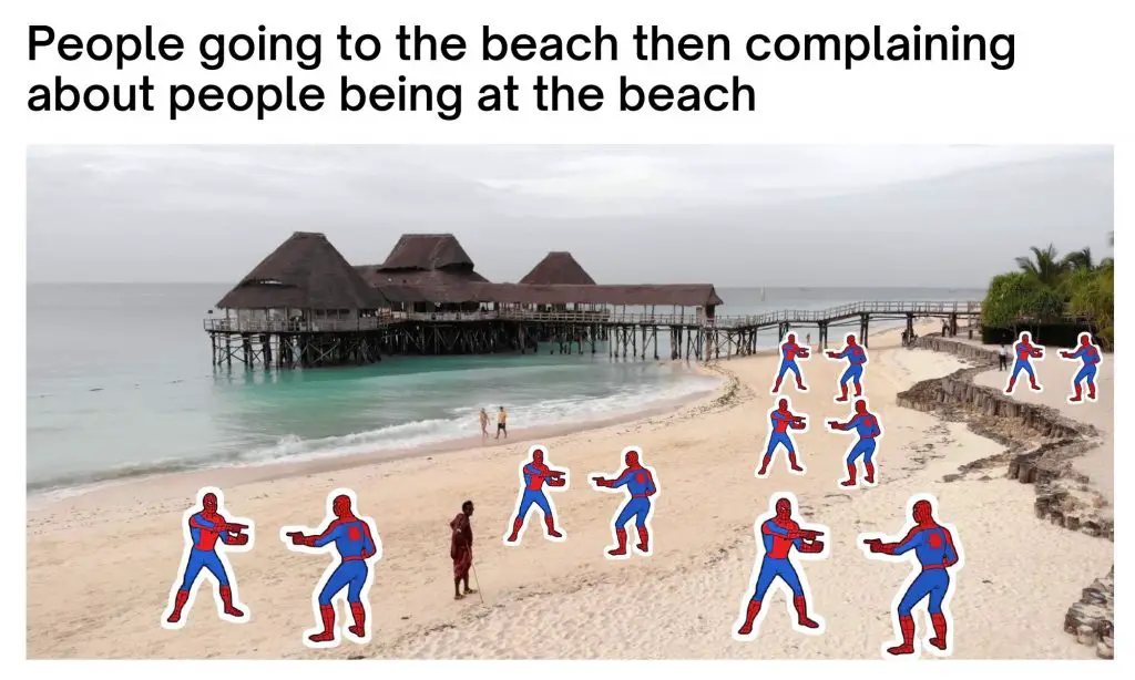Spider Man pointing at each other at beach